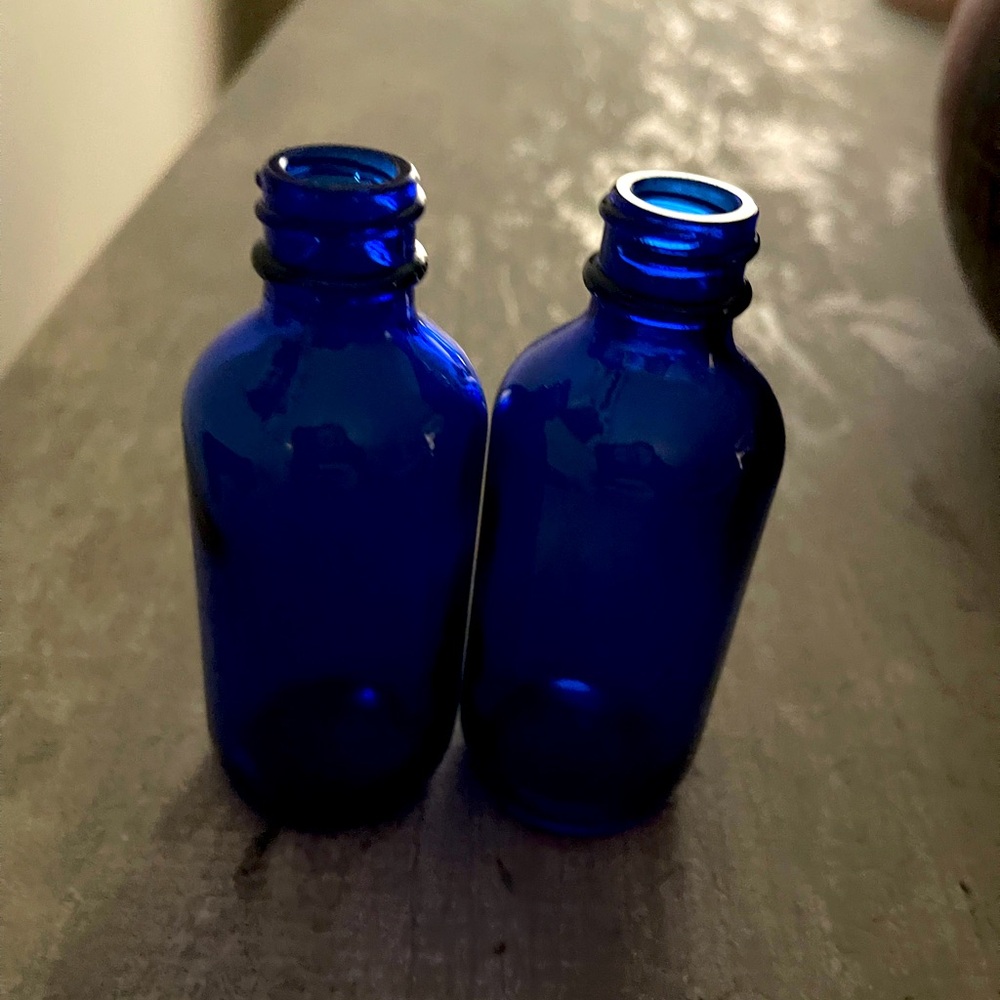 Vintage Blue glass bottles. Gorgeous. Set of 2.